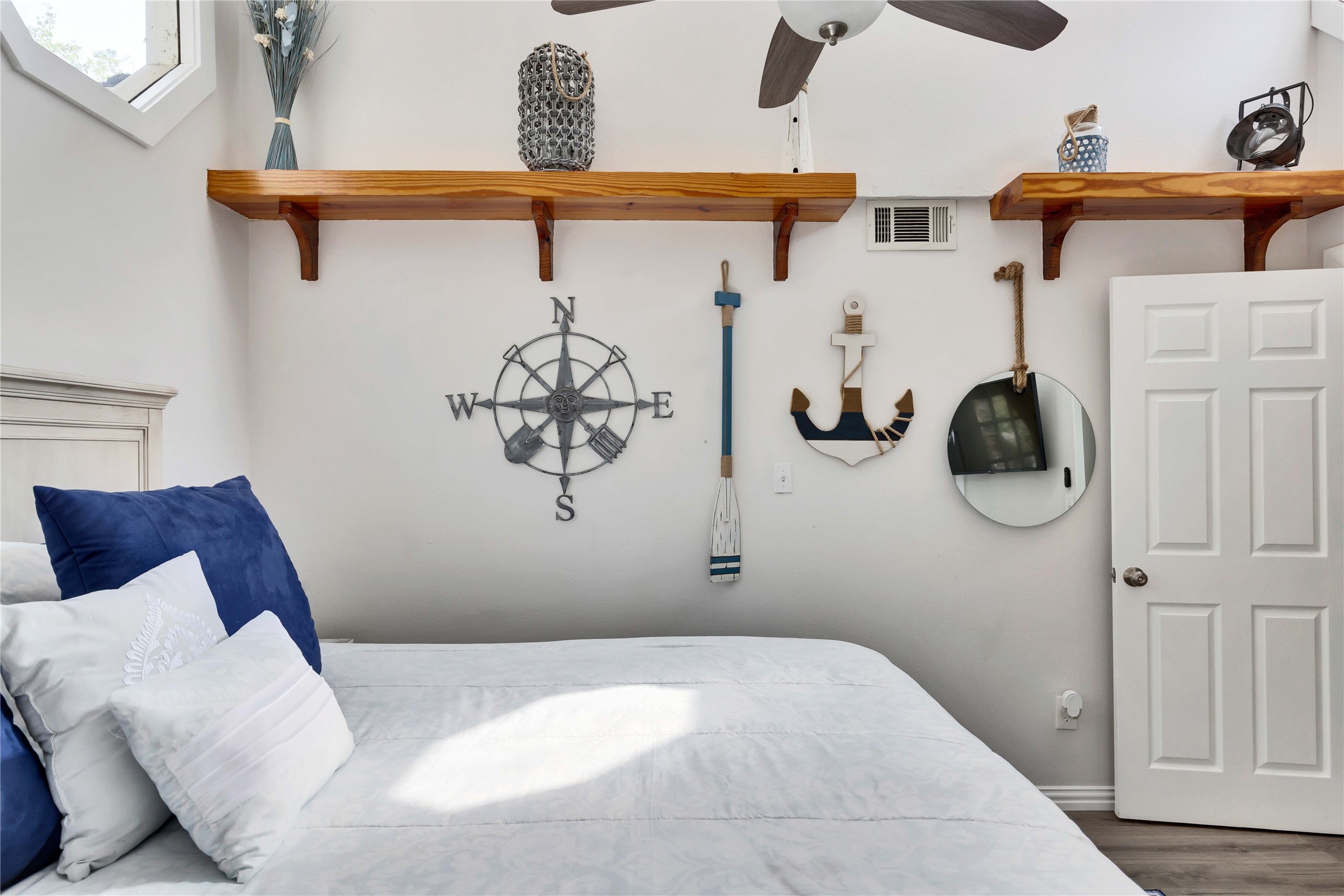 16108 Aqua Azul Path Austin, TX 78734 - Photo 20 of 40 a bedroom with a bed and cabinets