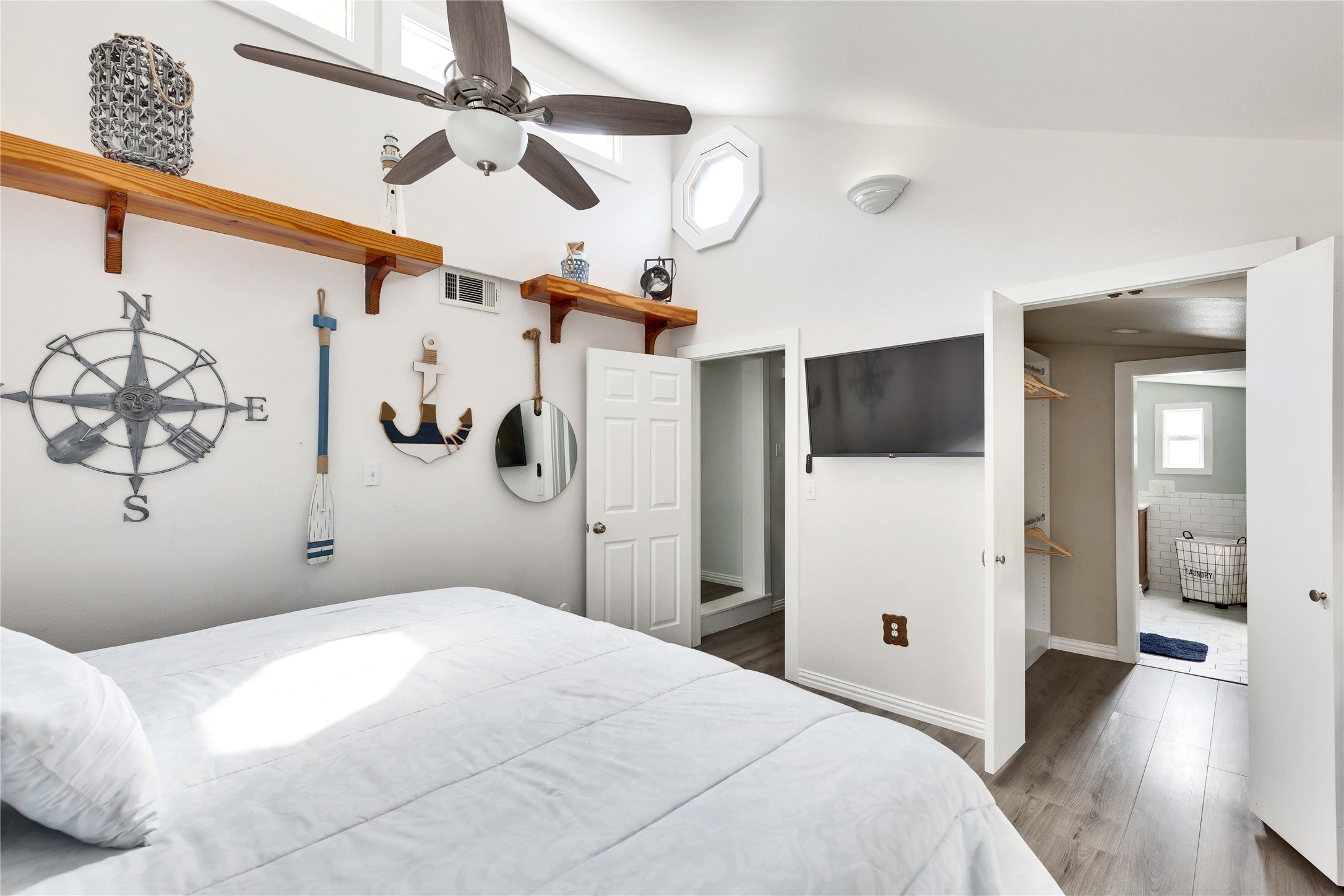 16108 Aqua Azul Path Austin, TX 78734 - Photo 21 of 40 a bedroom with a bed and wooden floor