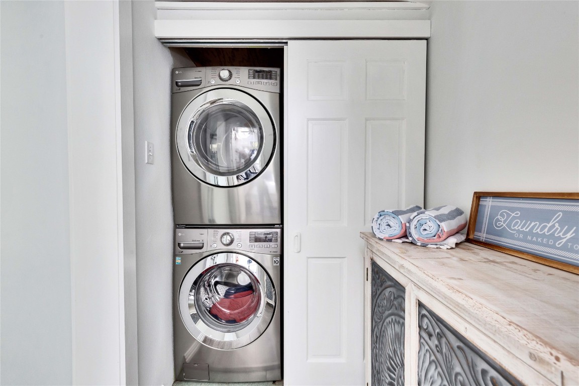 16108 Aqua Azul Path Austin, TX 78734 - Photo 32 of 40 a utility room with dryer and washer