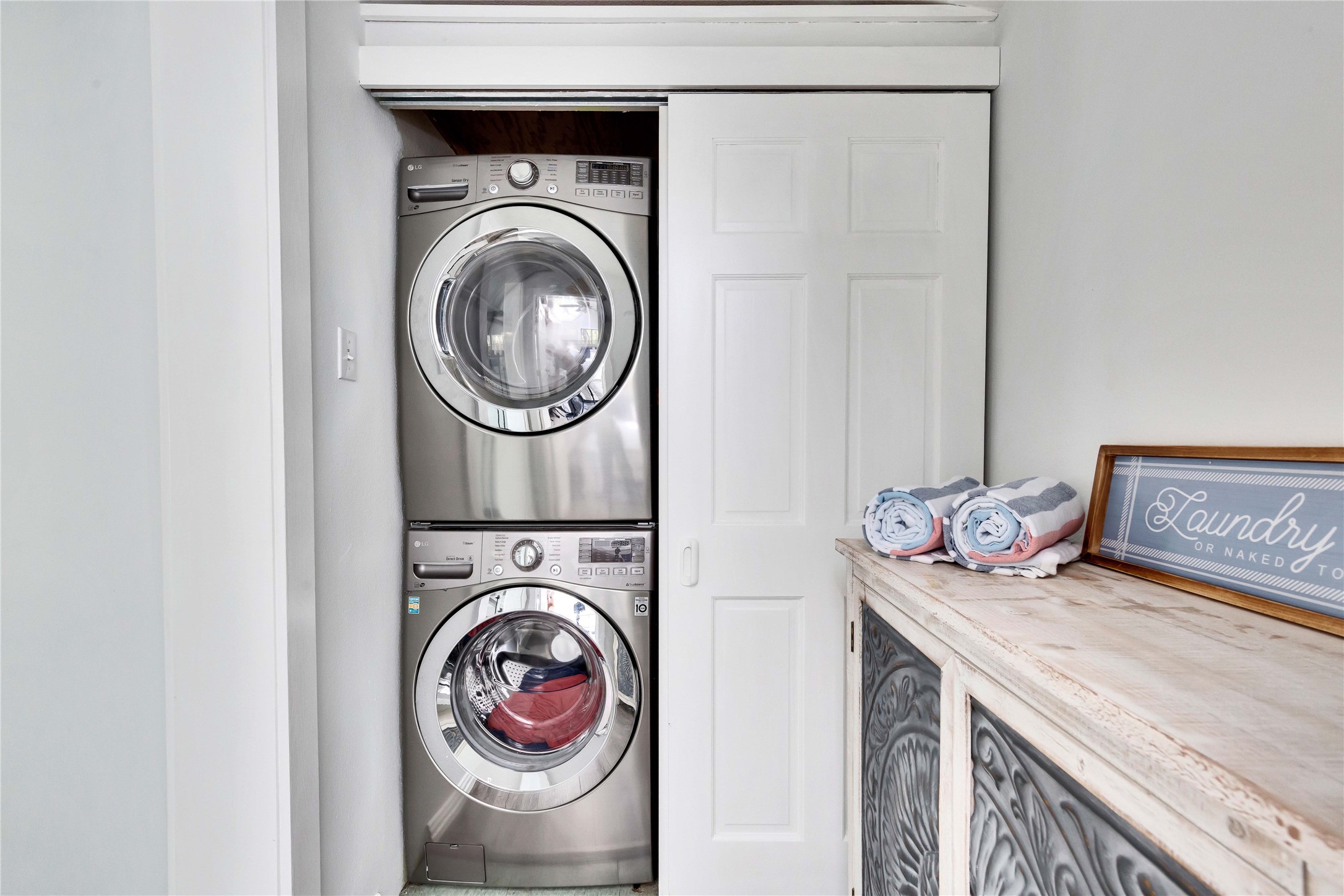 16108 Aqua Azul Path Austin, TX 78734 - Photo 32 of 40 a utility room with dryer and washer