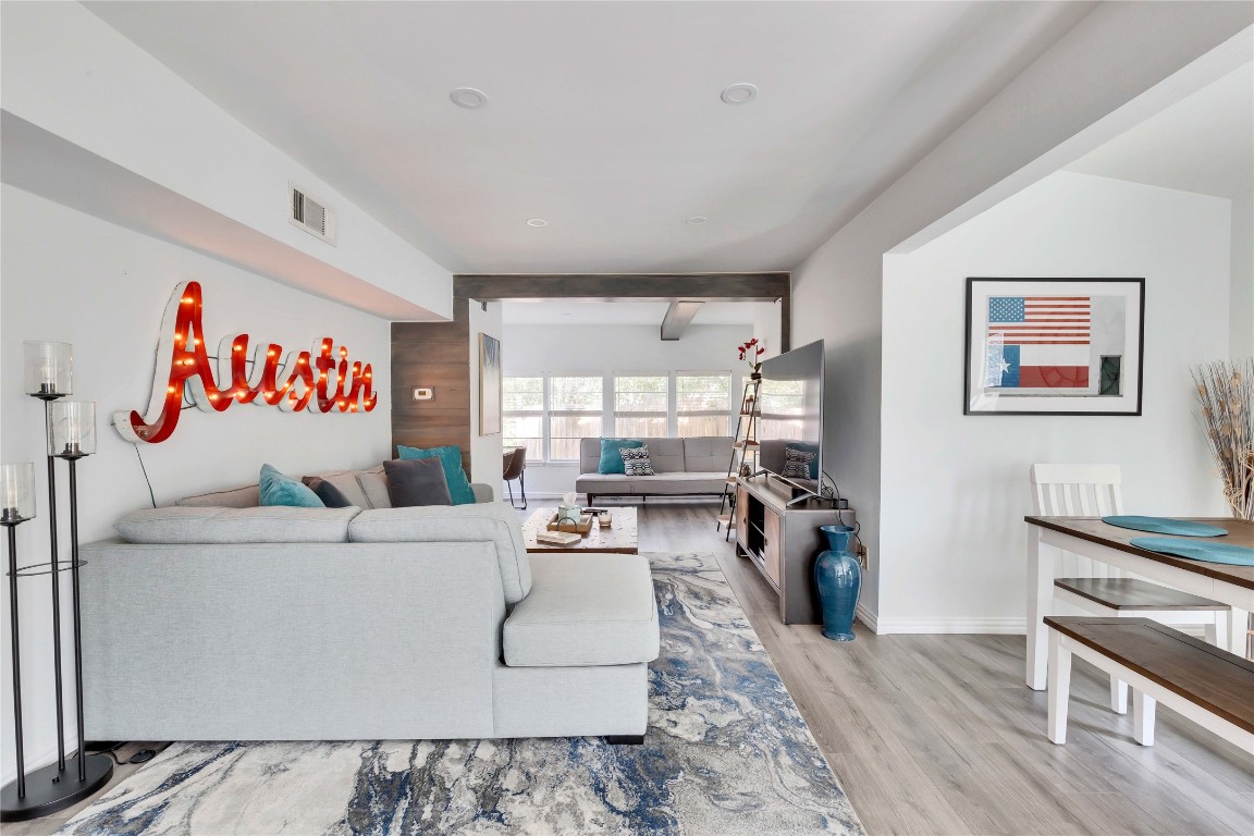 16108 Aqua Azul Path Austin, TX 78734 - Photo 7 of 40 a living room with furniture and a flat screen tv