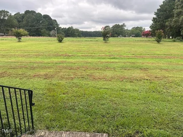 a view of an ocean from a yard