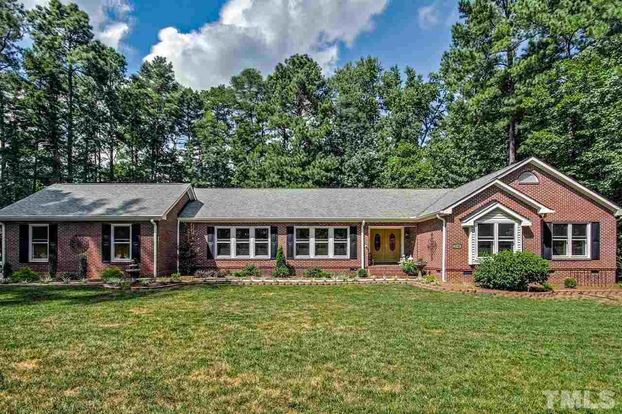 3148 Mt Vernon Church Road Raleigh, NC 27613 - Photo 1 of 29 a front view of a house with a yard