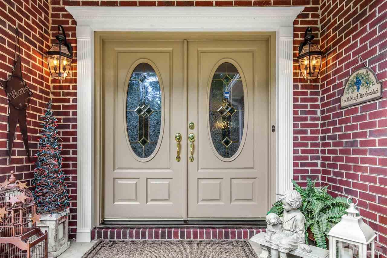 3148 Mt Vernon Church Road Raleigh, NC 27613 - Photo 3 of 29 a front view of a house with garden