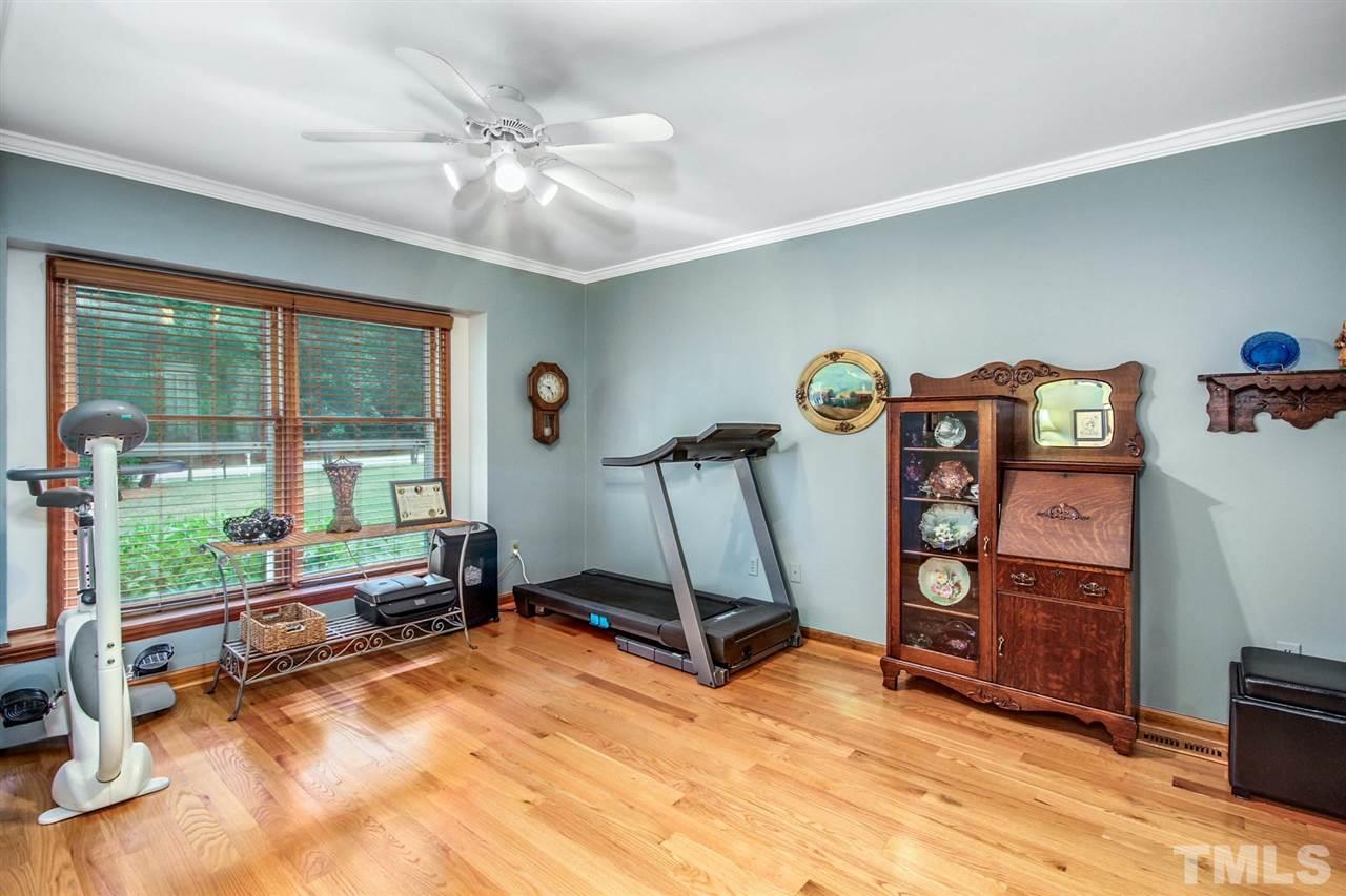 3148 Mt Vernon Church Road Raleigh, NC 27613 - Photo 22 of 29 a view of a room with gym equipment