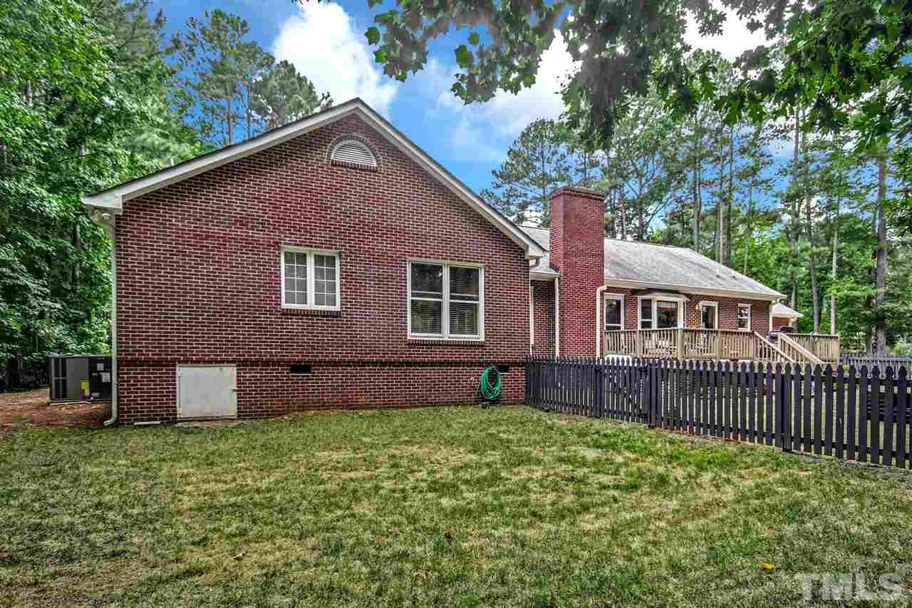 3148 Mt Vernon Church Road Raleigh, NC 27613 - Photo 27 of 29 a front view of a house with garden