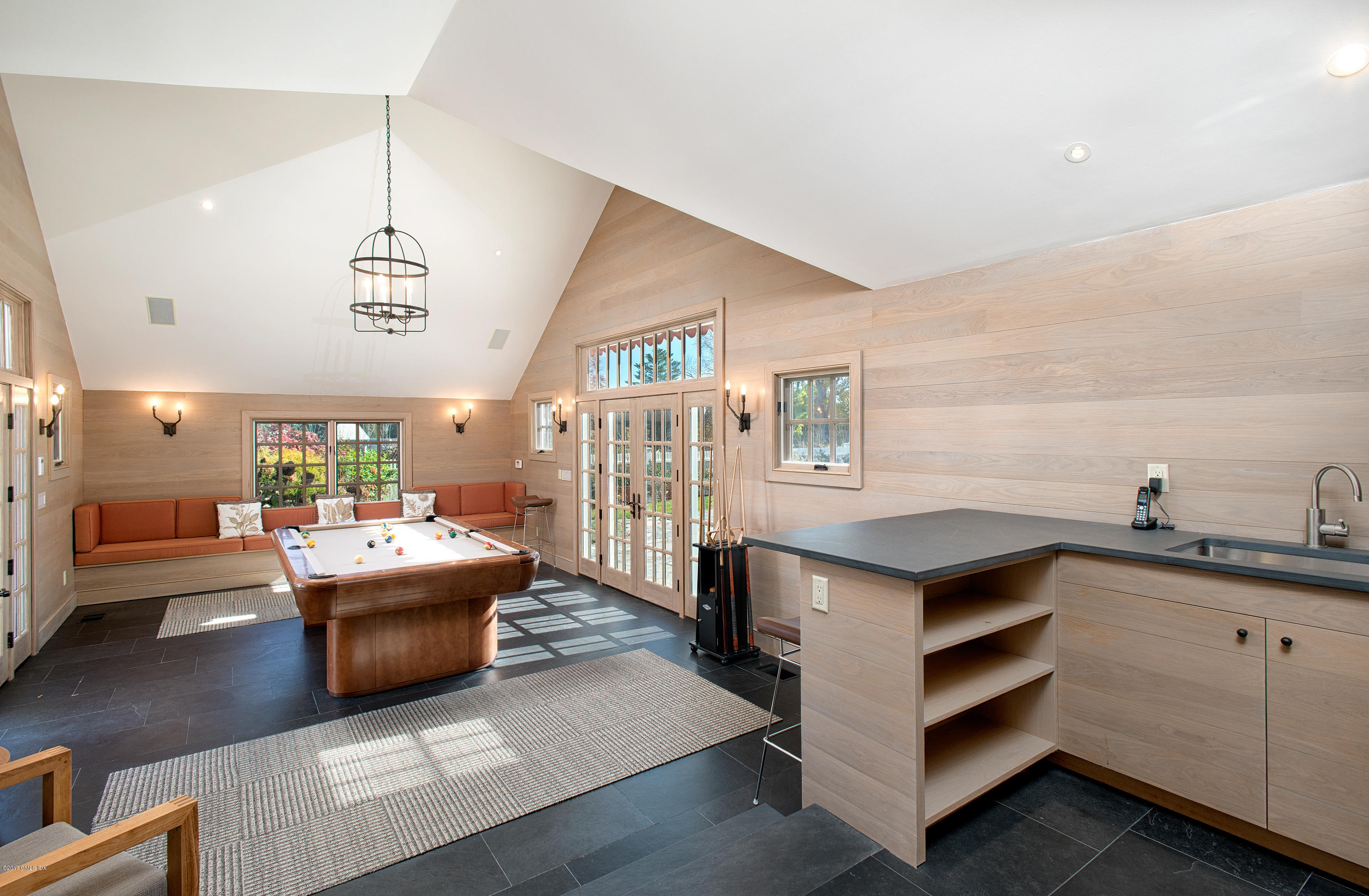 8 Mountain Wood Drive Greenwich, CT 06830 - Photo 19 of 22 a living room with furniture and a large window
