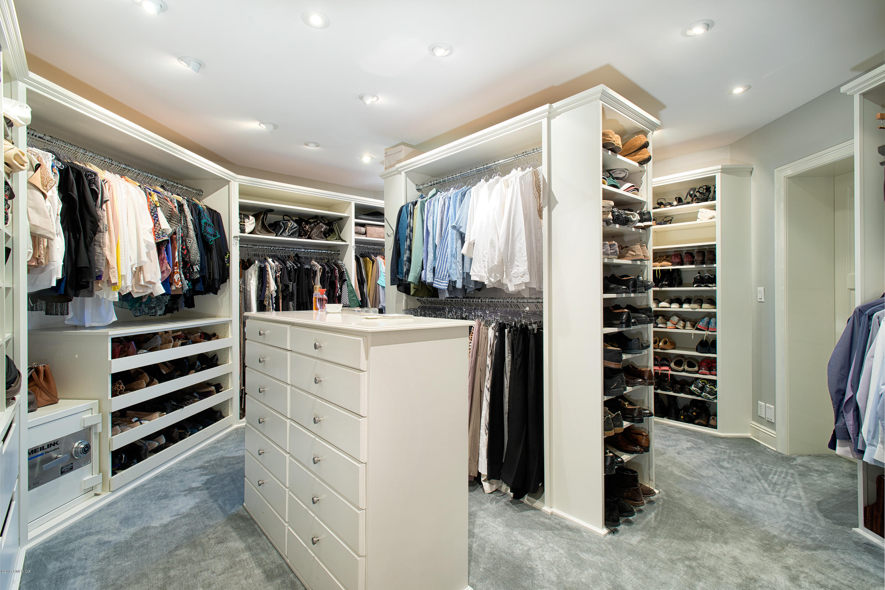 8 Mountain Wood Drive Greenwich, CT 06830 - Photo 9 of 22 a view of walk in closet with clothes and shoes