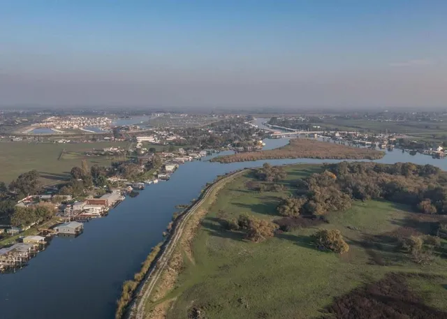 a front view of a house with parking space
