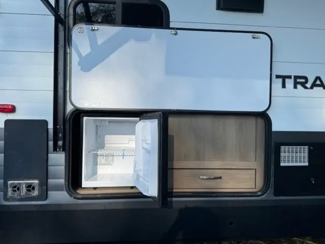 a bedroom with a bed and a mirror