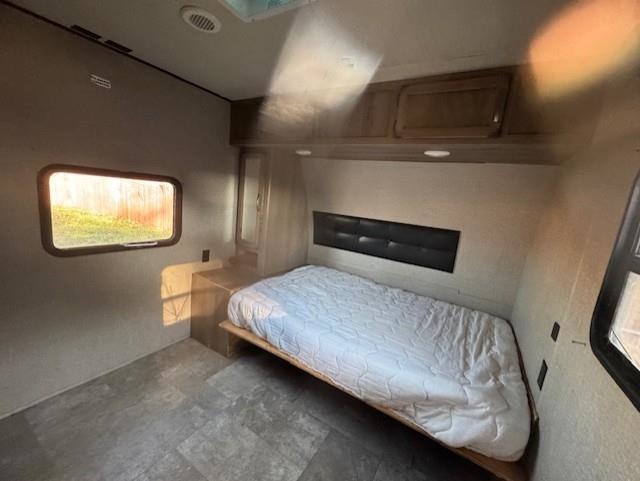 2578 Taylor Road Bethel Island, CA 94511 - Photo 23 of 23 a bedroom with a bed and a mirror