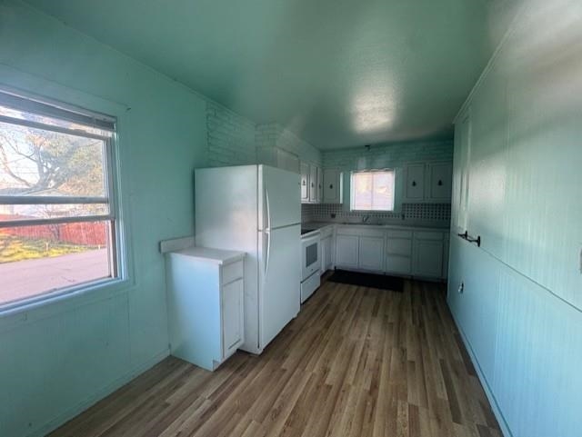 2578 Taylor Road Bethel Island, CA 94511 - Photo 10 of 23 a view of an empty room with wooden floor and a window