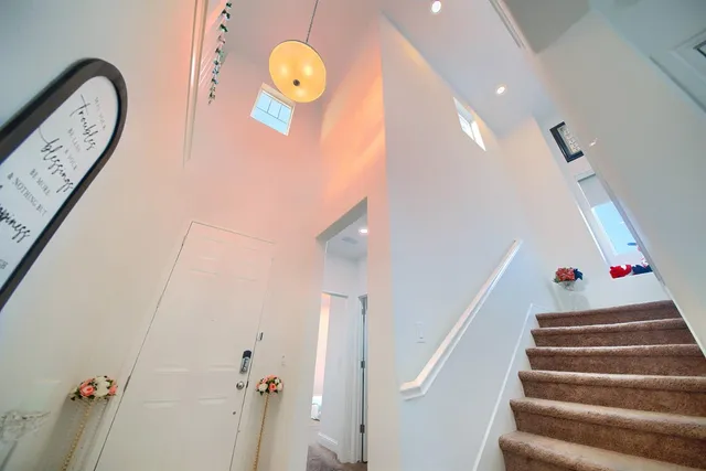 a view of a hallway with entryway