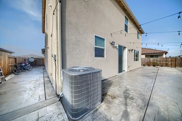 a view of living room kitchen and entryway