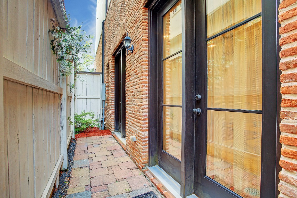 1307 Rosedale Street Houston, TX 77004 - Photo 11 of 32 Patio on the back of the home provides open space and light to the ground level bedroom or large office. Perfect for your pup or a little gardening.