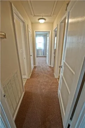 a view of an empty room and window