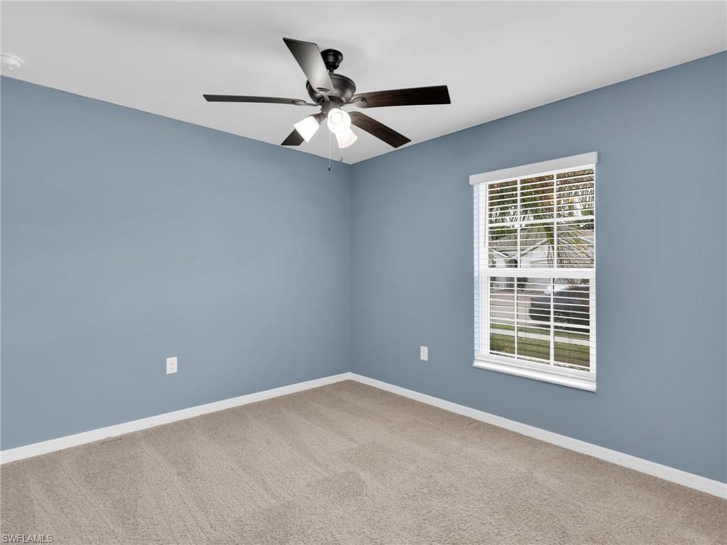 731 Hadley Place West Naples, FL 34104 - Photo 3 of 30 Bedroom 2 With Ceiling Fan and Faux Wood Blinds