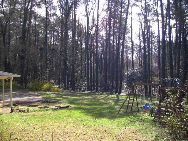 3125 Cartwright Drive Raleigh, NC 27612 - Photo 25 of 25 Gorgeous landscape w/ mature Fig tree, azaleas, dogwoods galore - about to look like "Augusta national" around here! Yard