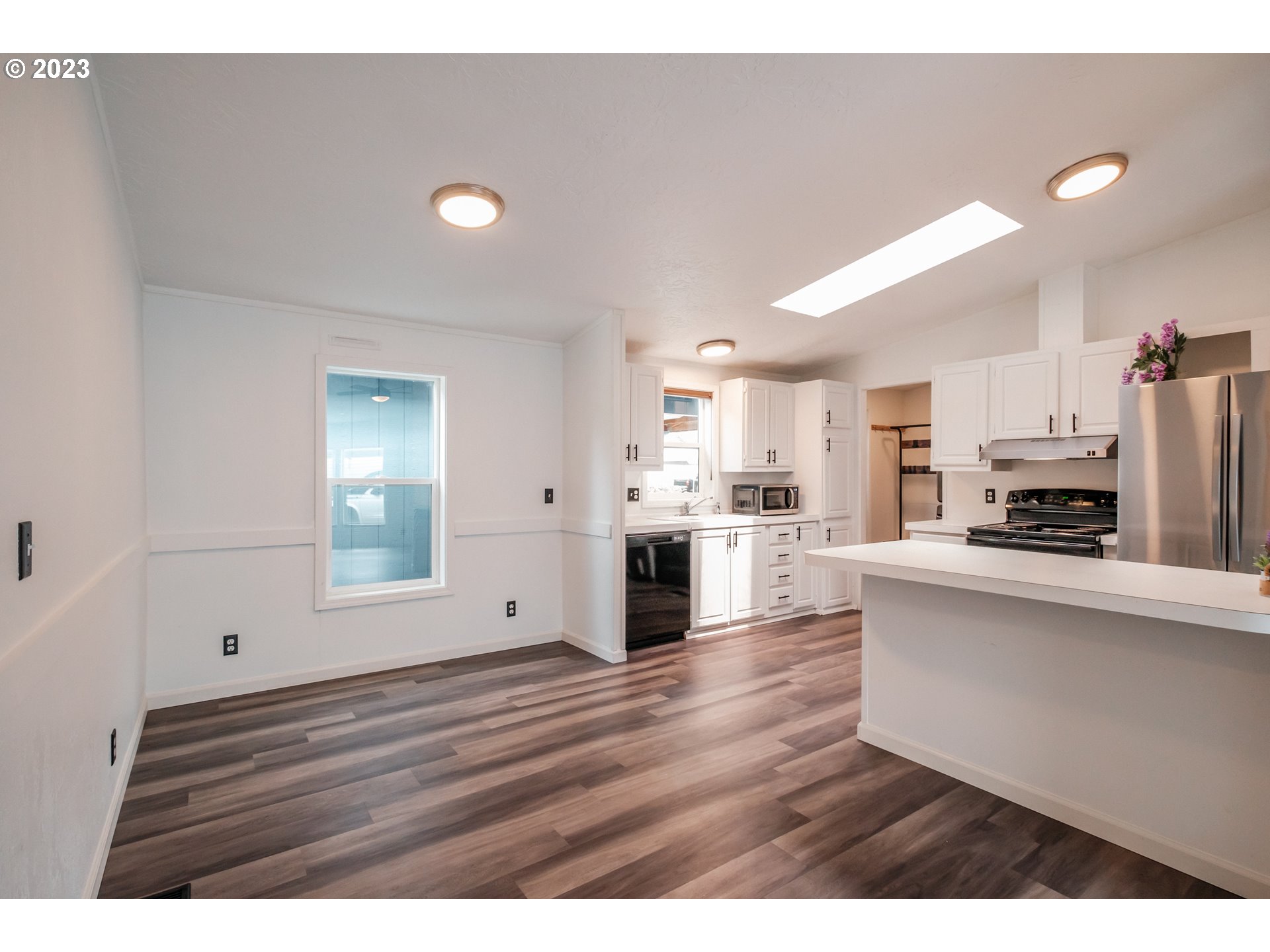 1401 West Ellendale Avenue, Unit 80 Dallas, OR 97338 - Photo 11 of 48 a view of kitchen with wooden floor