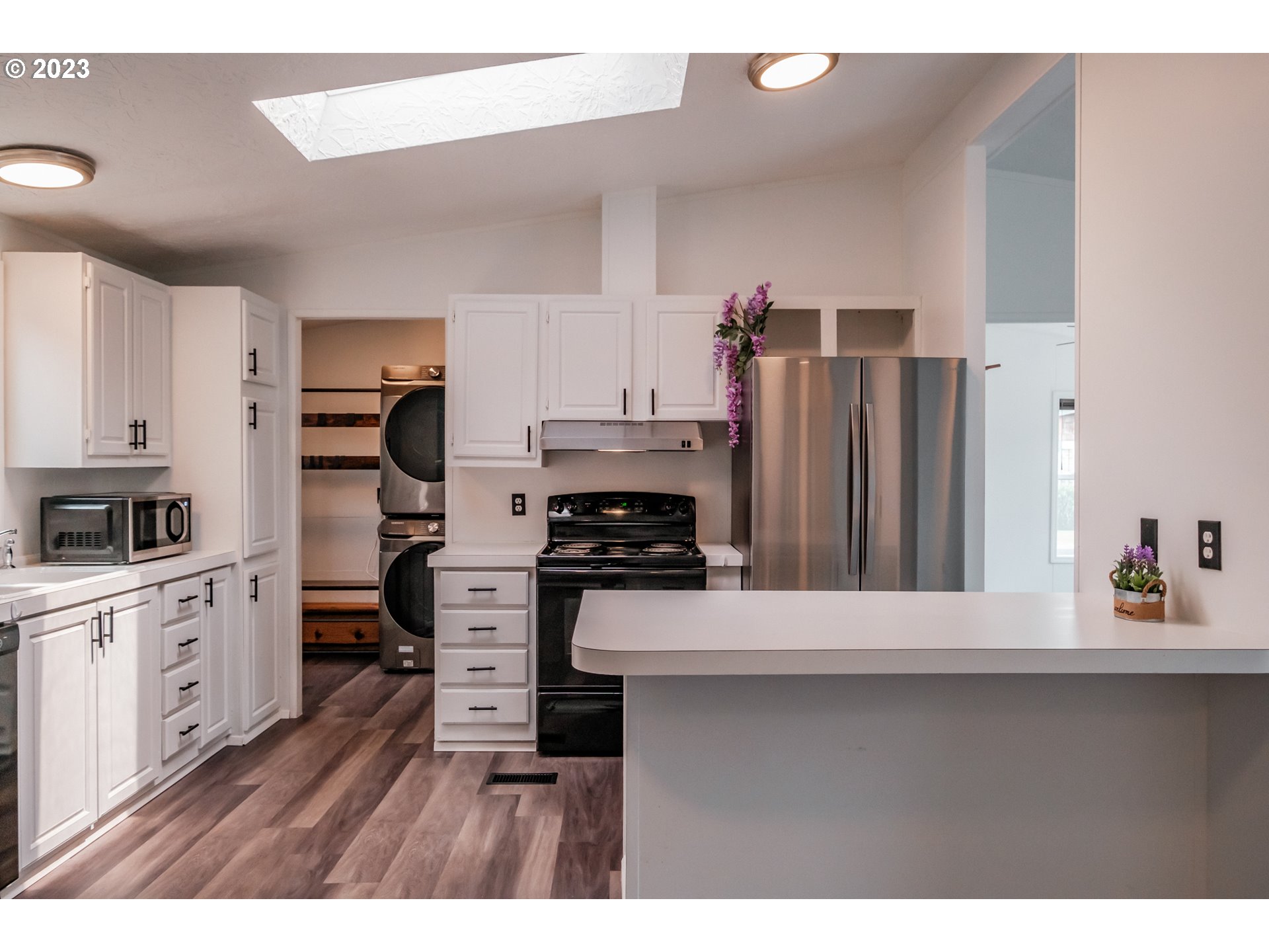 1401 West Ellendale Avenue, Unit 80 Dallas, OR 97338 - Photo 14 of 48 a kitchen with appliances cabinets and a counter top space