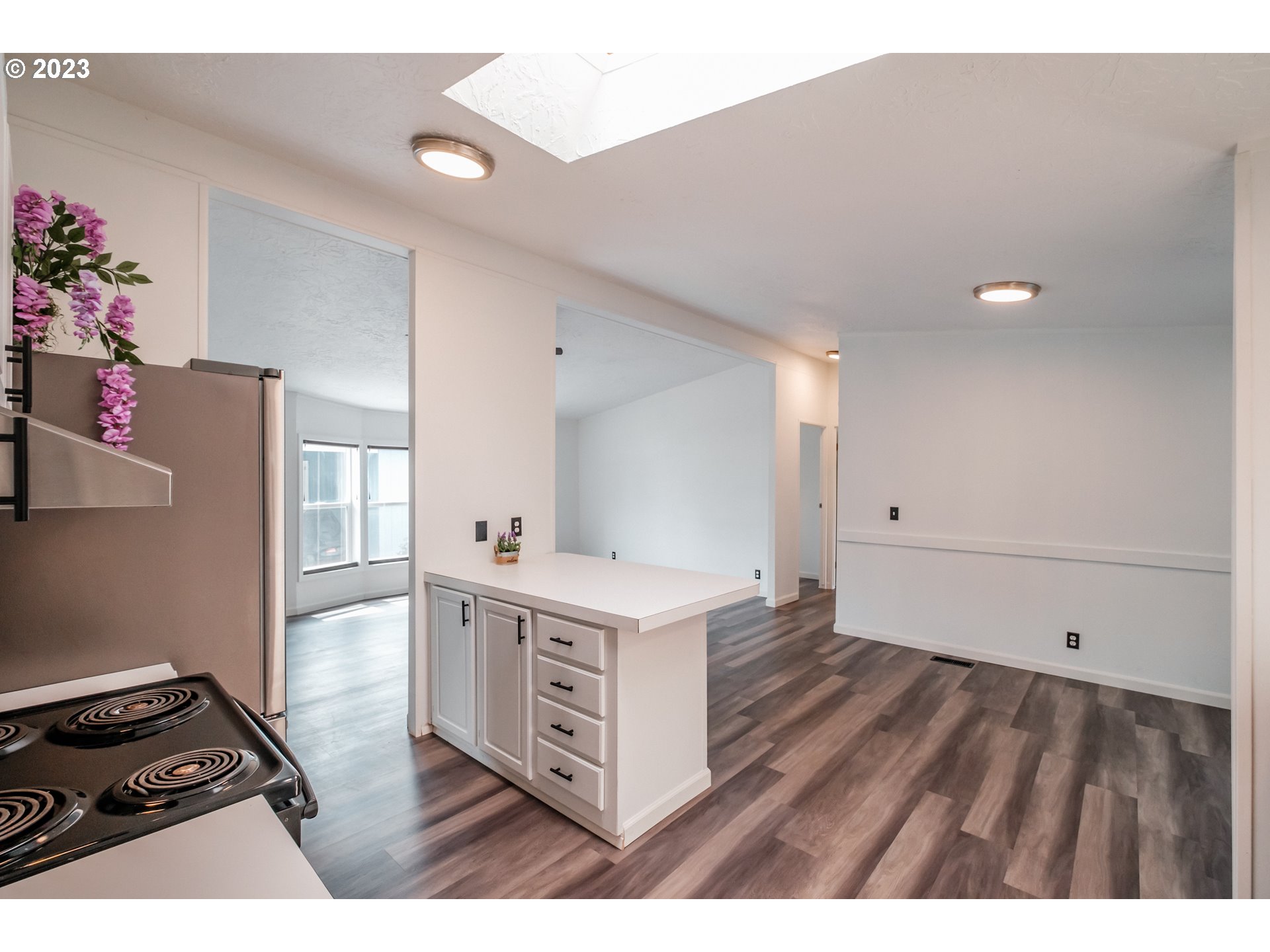 1401 West Ellendale Avenue, Unit 80 Dallas, OR 97338 - Photo 19 of 48 a kitchen with a stove and a refrigerator