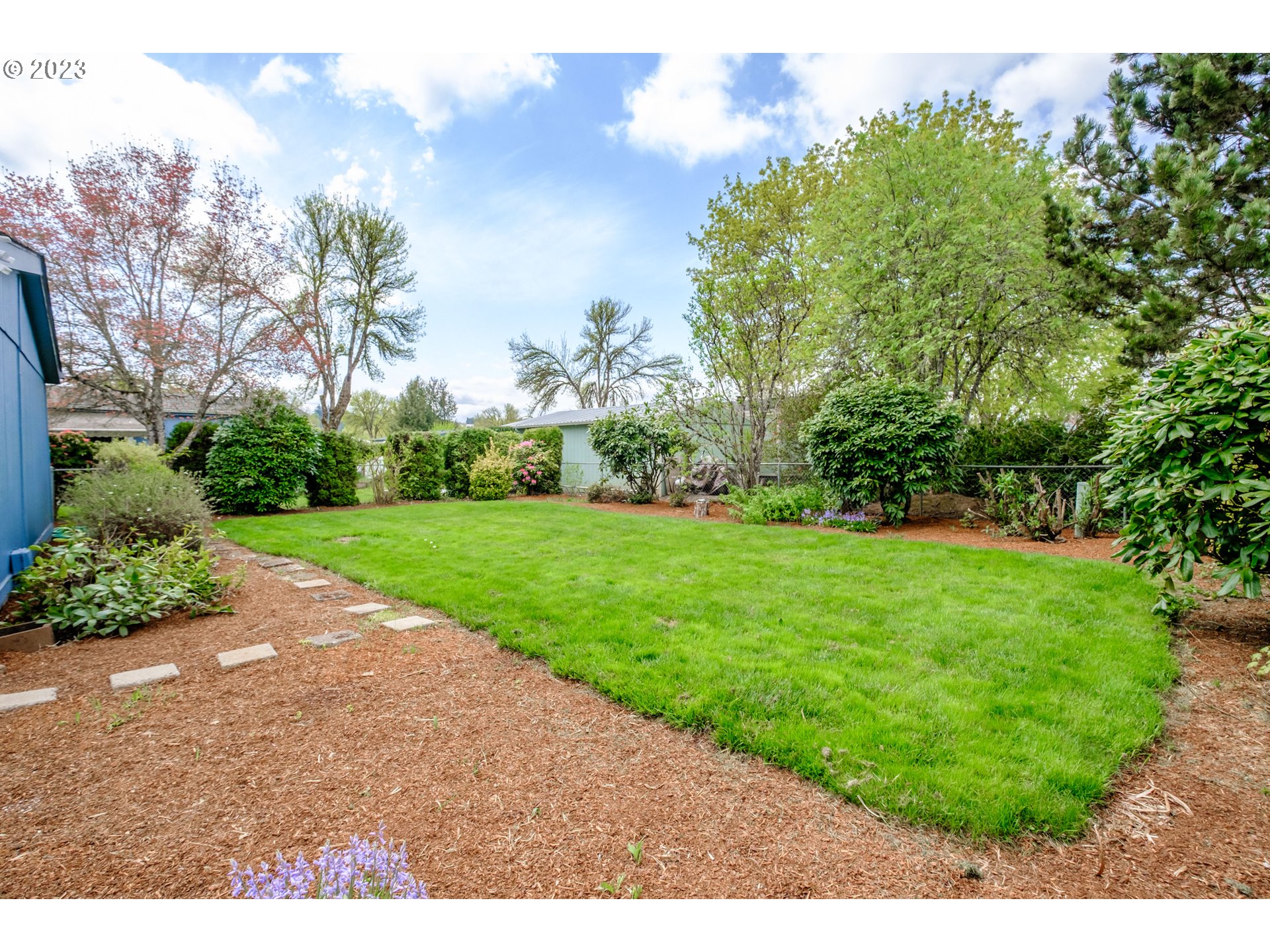 1401 West Ellendale Avenue, Unit 80 Dallas, OR 97338 - Photo 39 of 48 a view of yard with green space