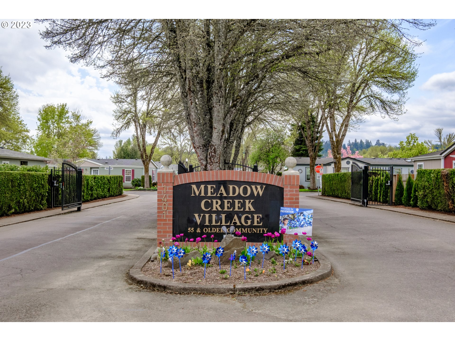 1401 West Ellendale Avenue, Unit 80 Dallas, OR 97338 - Photo 45 of 48 a sign on the side of the road