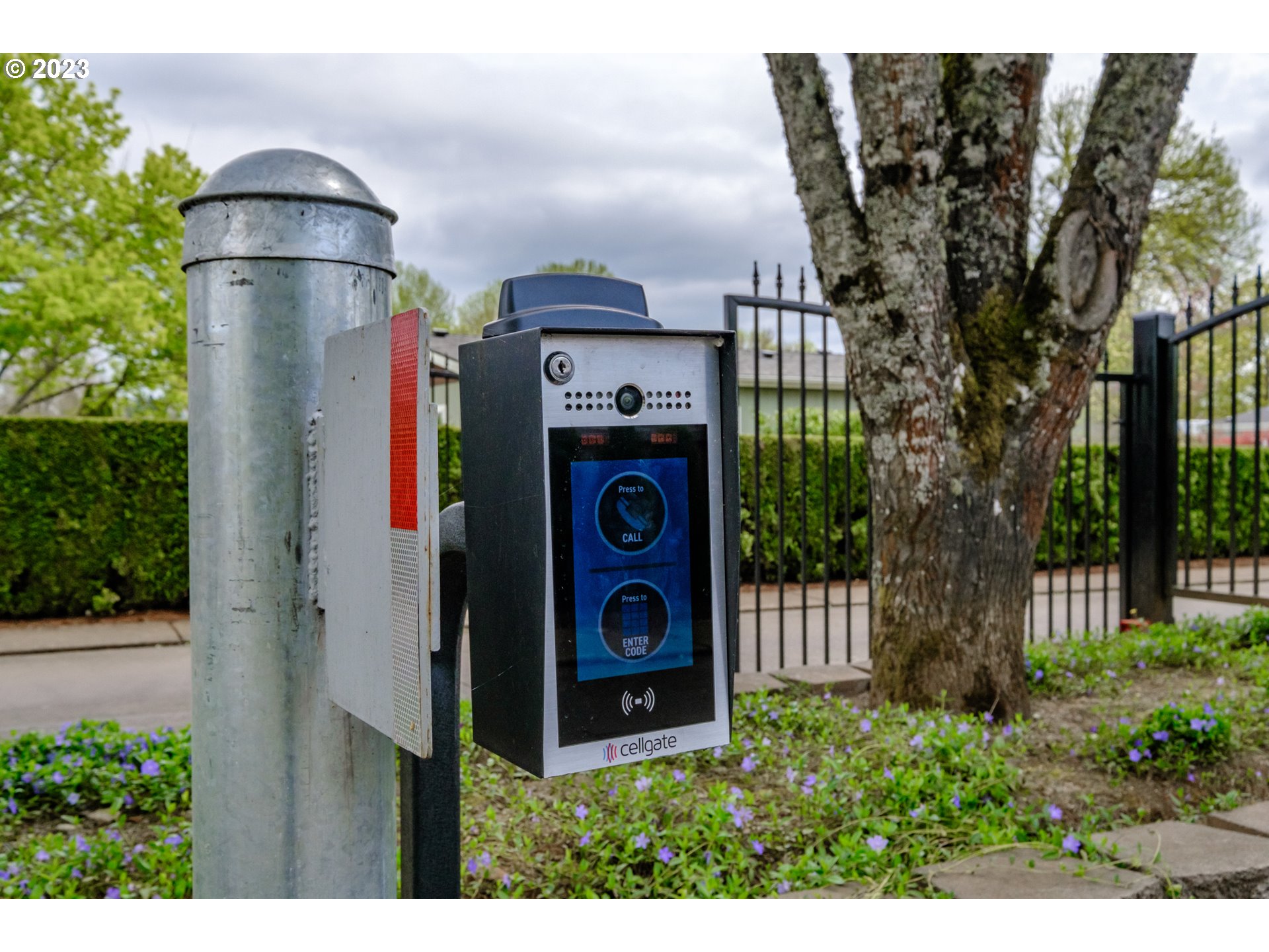 1401 West Ellendale Avenue, Unit 80 Dallas, OR 97338 - Photo 47 of 48 a sign board with buildings in the background