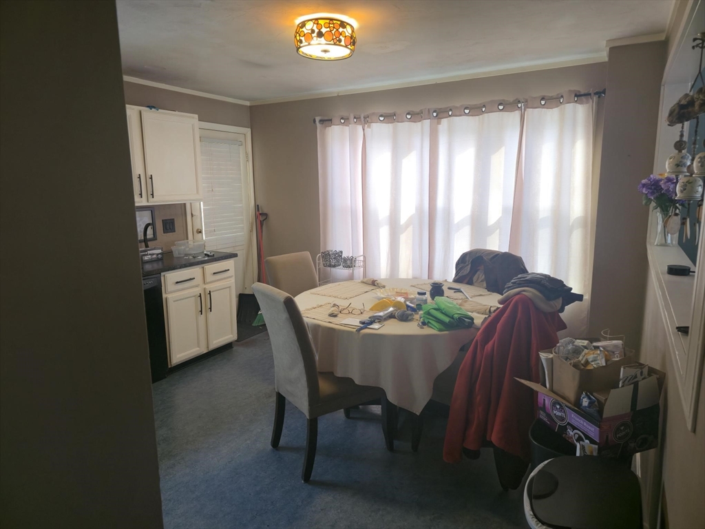 289 Commercial Street Whitman, MA 02382 - Photo 4 of 6 a dining room with furniture and window