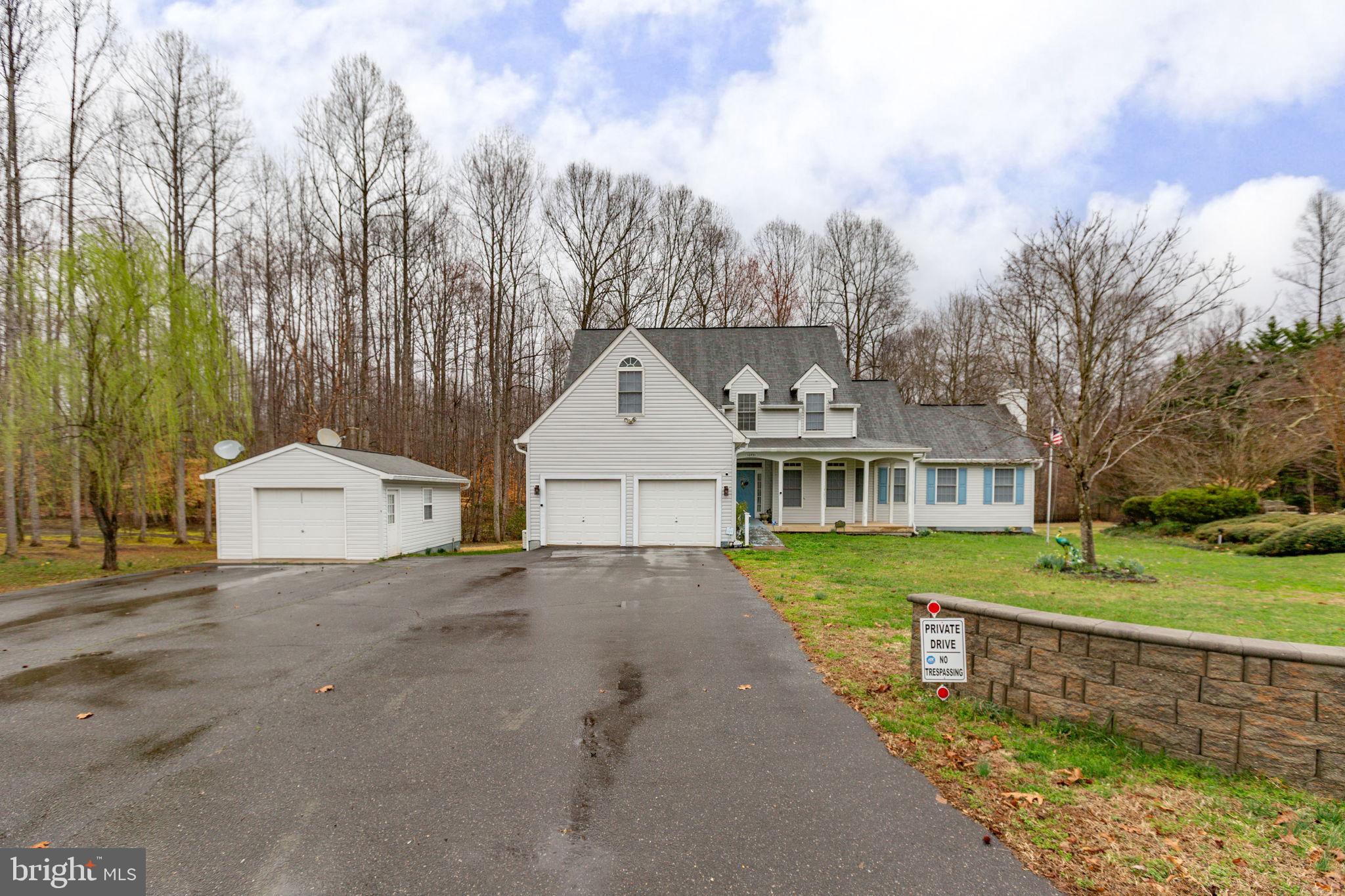 10721 Colbys Lane King George, VA 22485 - Photo 1 of 50 a view of a yard in front of the house