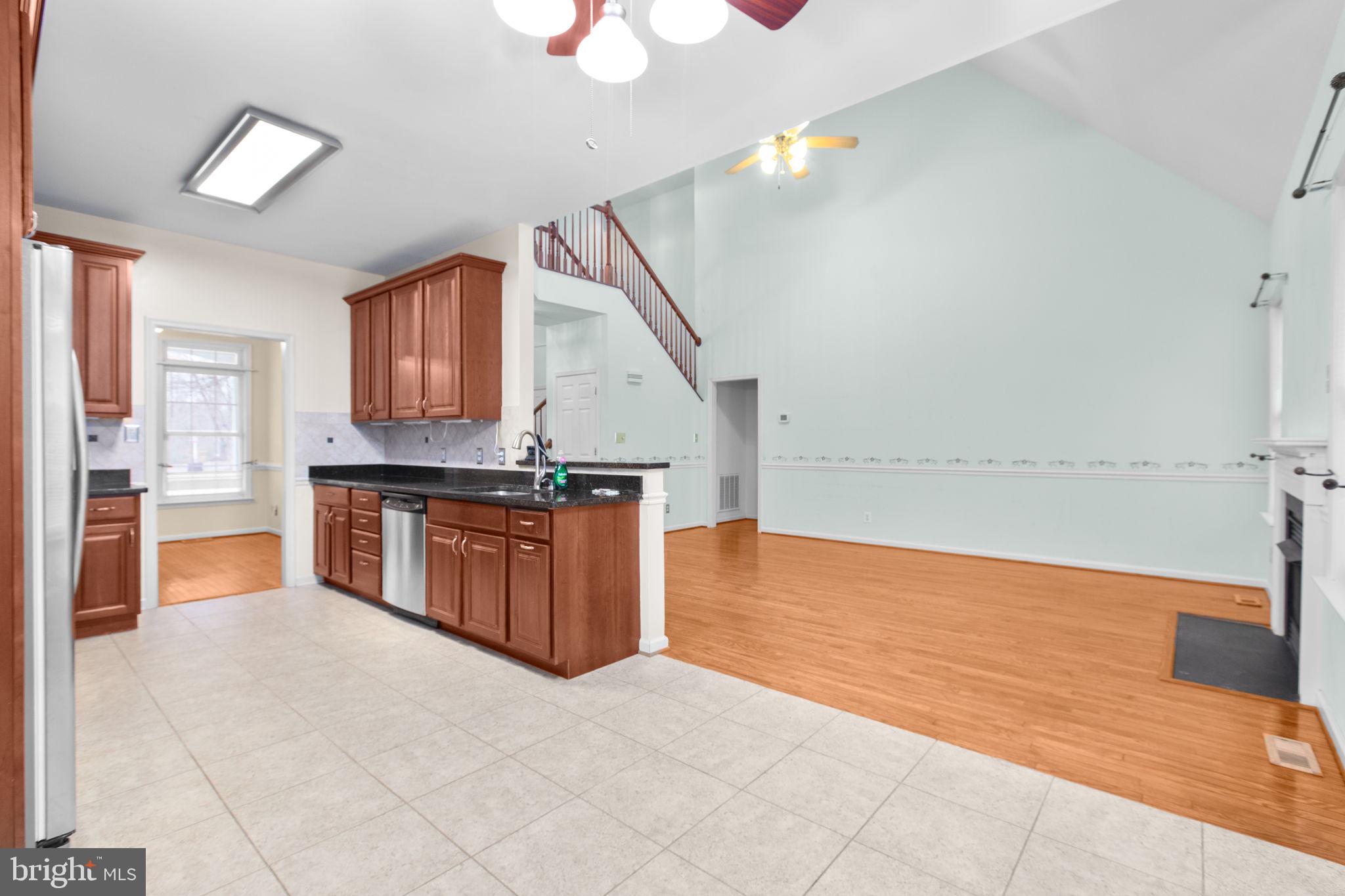 10721 Colbys Lane King George, VA 22485 - Photo 14 of 50 a view of kitchen with microwave and cabinets