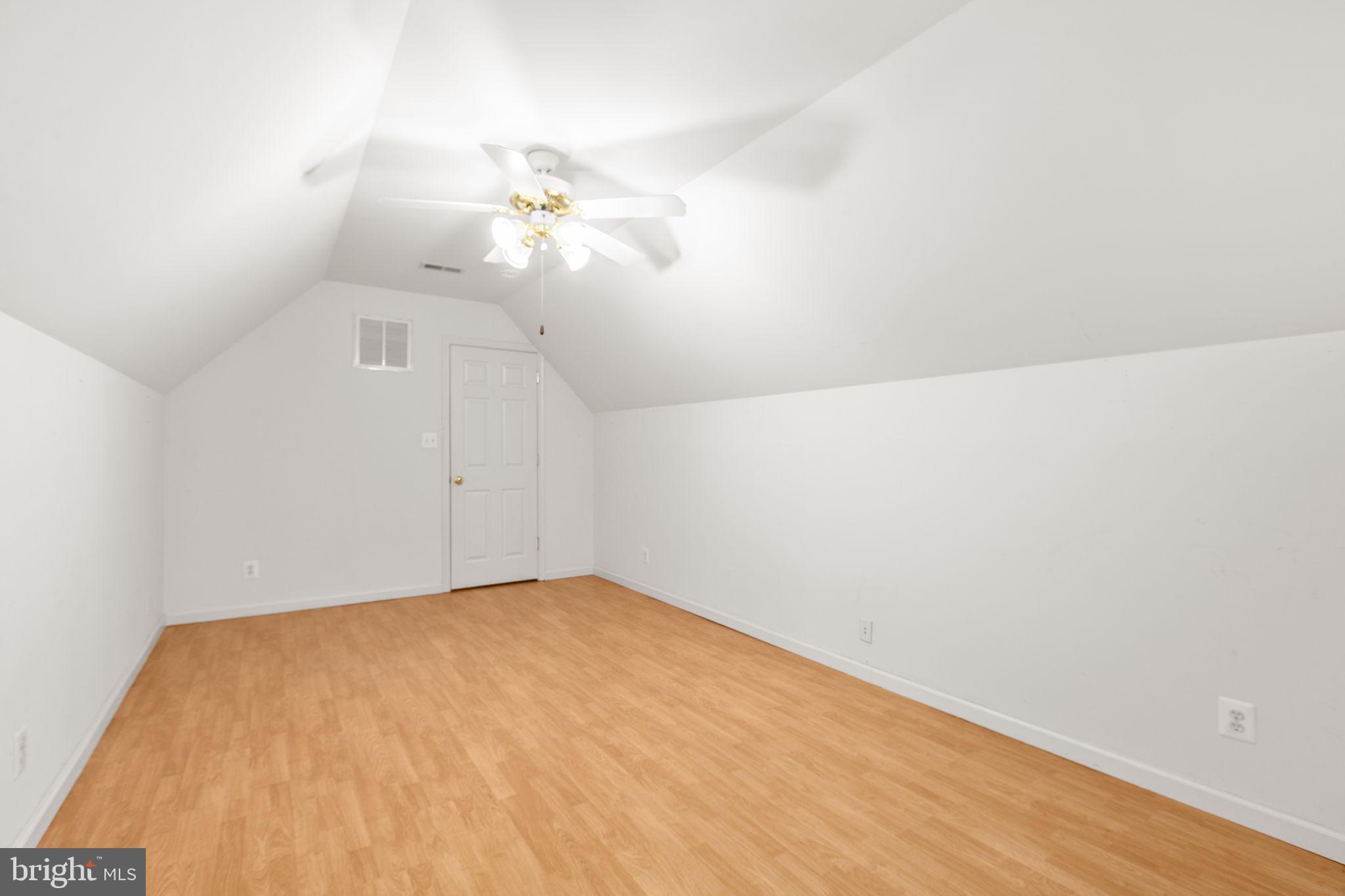 10721 Colbys Lane King George, VA 22485 - Photo 33 of 50 a view of a room with wooden floor