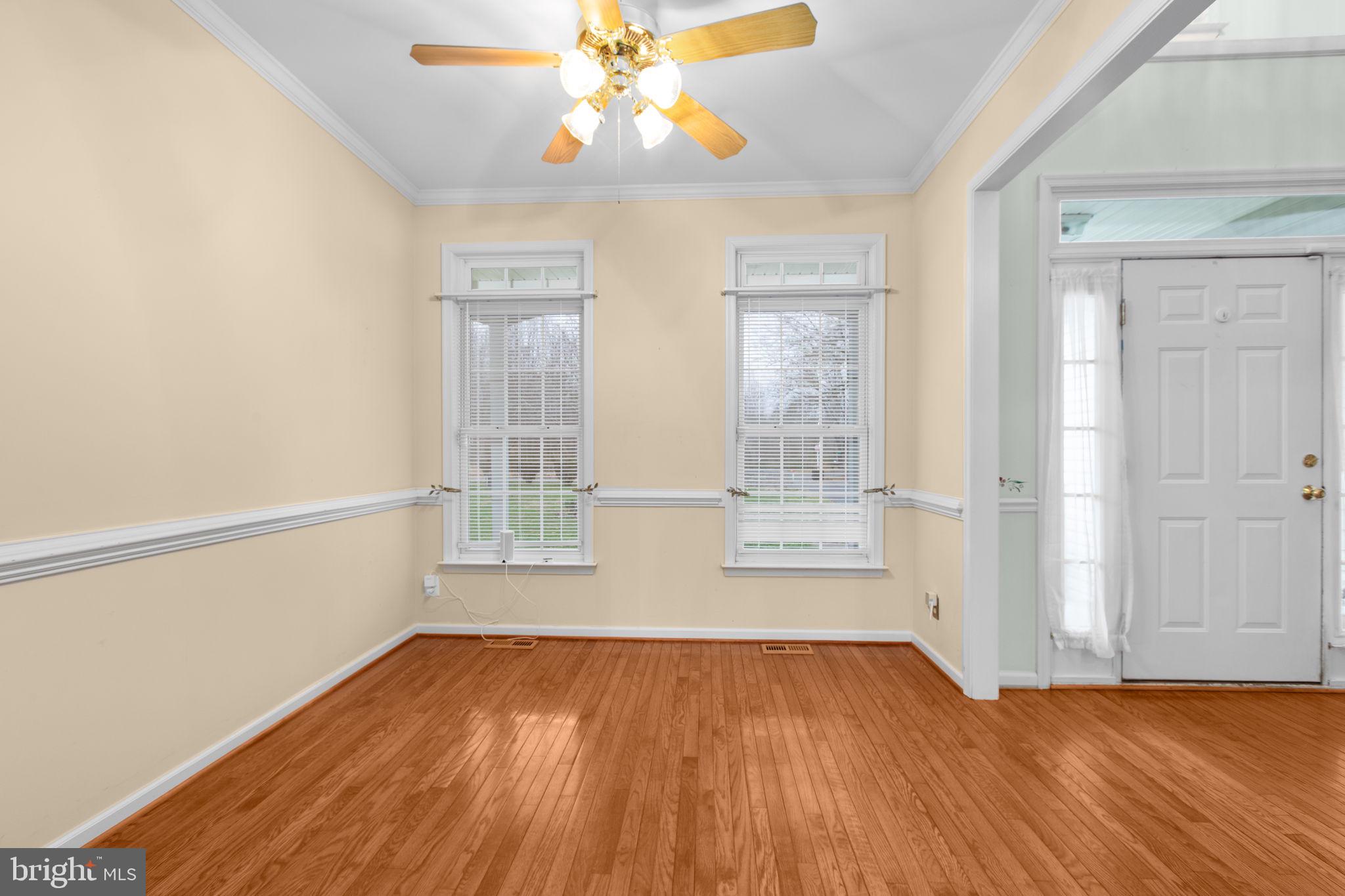 10721 Colbys Lane King George, VA 22485 - Photo 9 of 50 wooden floor in an empty room with a window