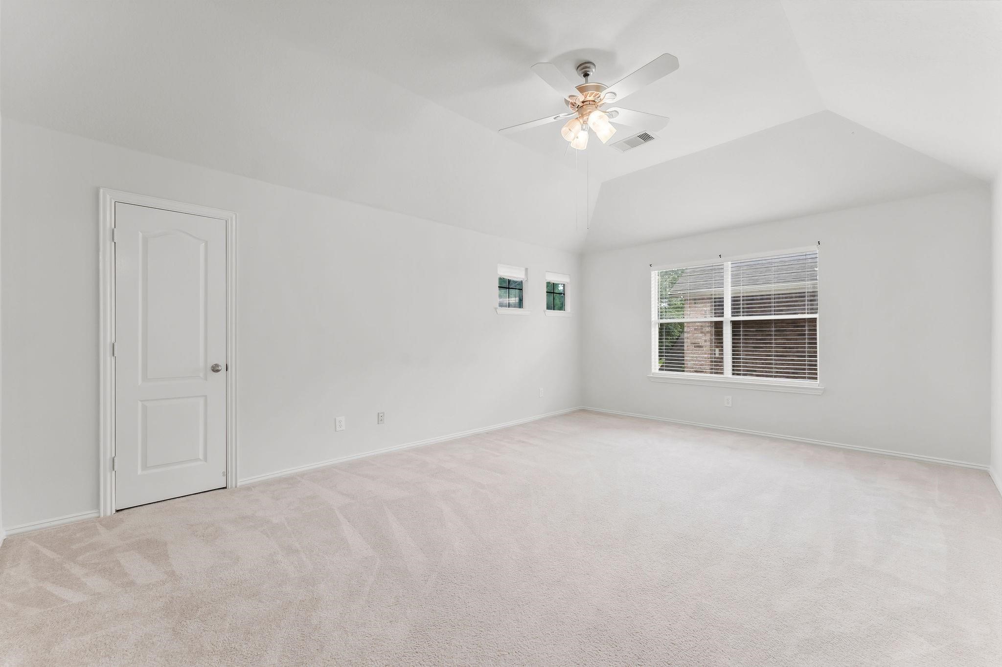 29902 Legends Ridge Drive Spring, TX 77386 - Photo 19 of 29 a view of an empty room with a window
