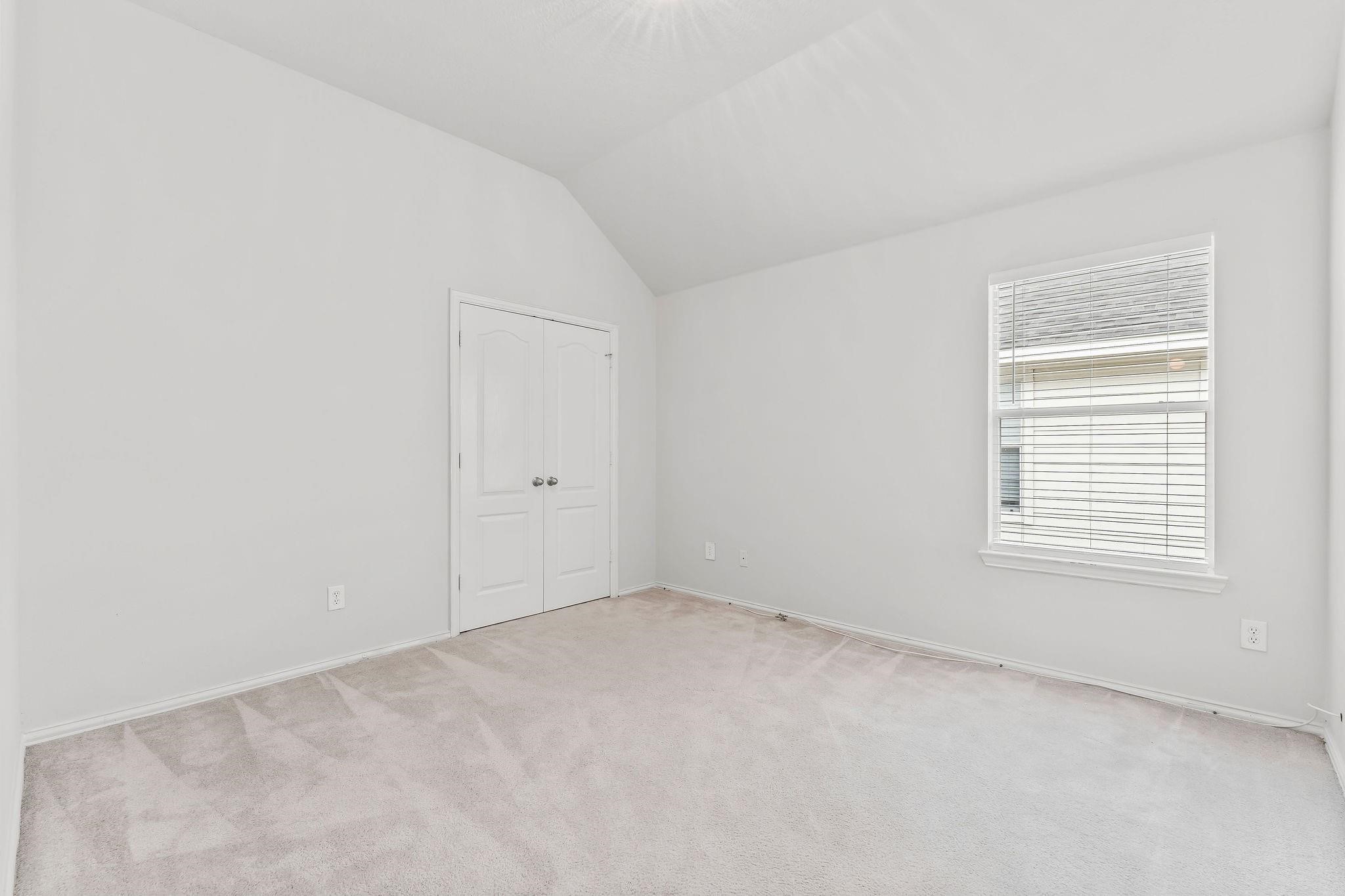 29902 Legends Ridge Drive Spring, TX 77386 - Photo 25 of 29 an empty room with a window