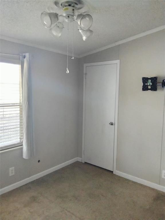855 Tom Sawyer Road Ennis, TX 75119 - Photo 17 of 17 an empty room with a window