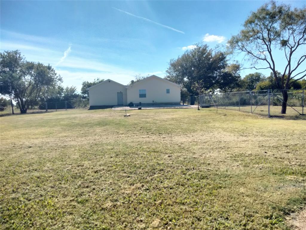 855 Tom Sawyer Road Ennis, TX 75119 - Photo 6 of 17 a view of an ocean from a yard