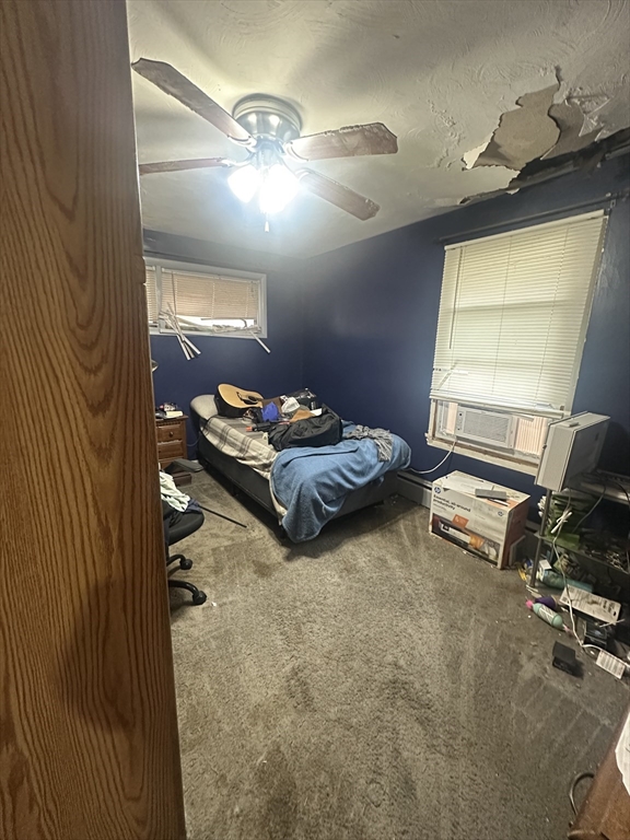 345 Chace Street Somerset, MA 02726 - Photo 12 of 18 a bedroom with bed and a window