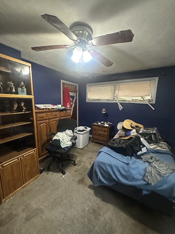 345 Chace Street Somerset, MA 02726 - Photo 13 of 18 a living room with furniture and a chandelier