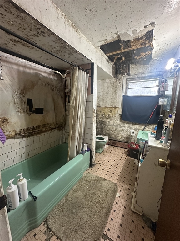 345 Chace Street Somerset, MA 02726 - Photo 9 of 18 a living room with furniture and a flat screen tv