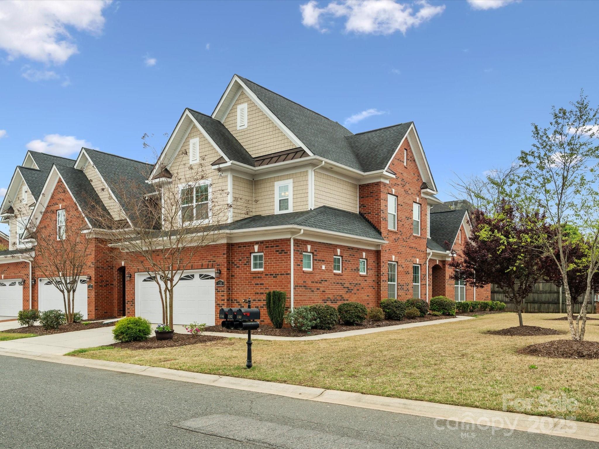 130 Villa Lake Drive Fort Mill, SC 29708 - Photo 2 of 46 front view of a house with a yard