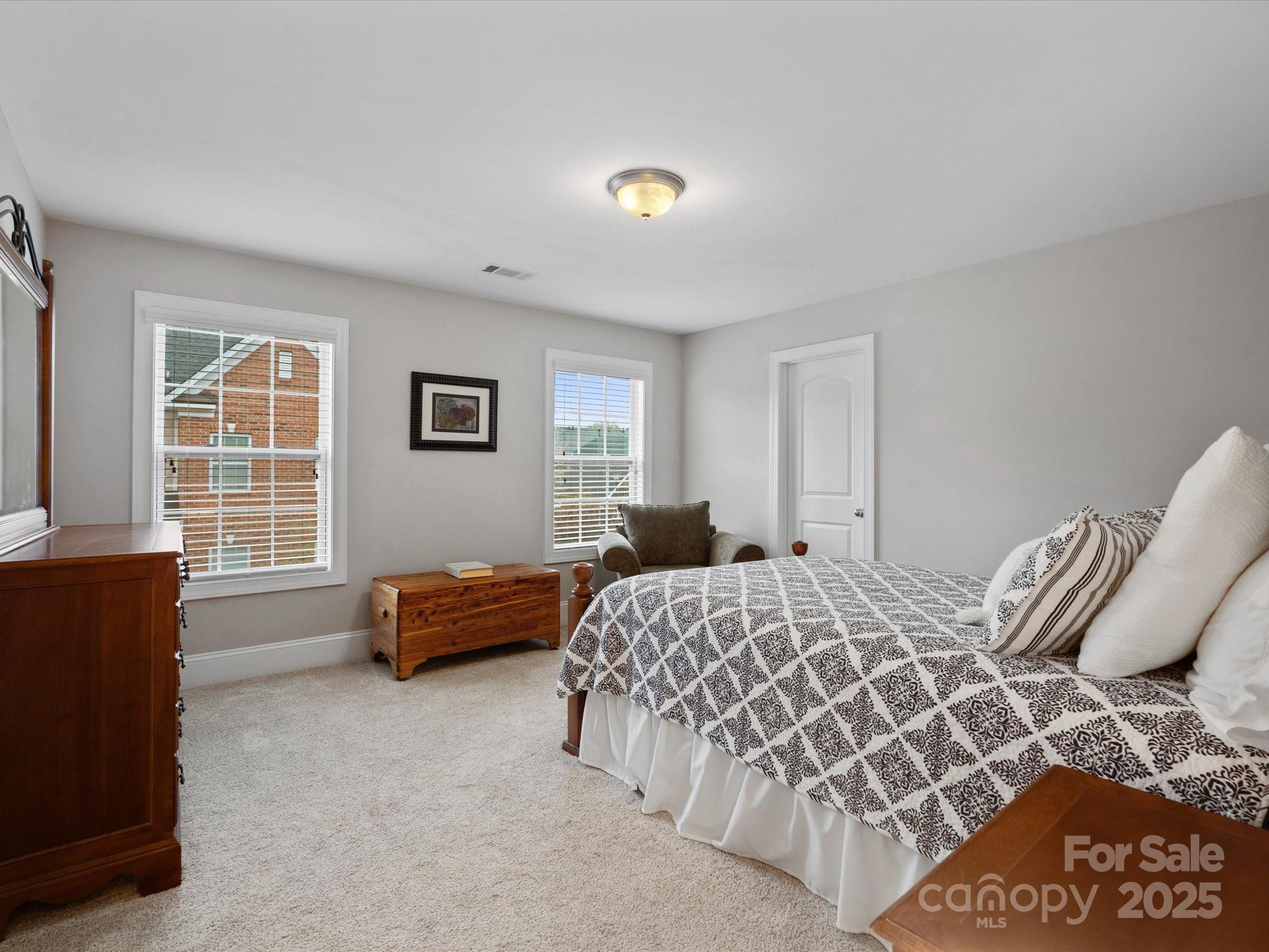 130 Villa Lake Drive Fort Mill, SC 29708 - Photo 26 of 46 a bedroom with a bed and a window