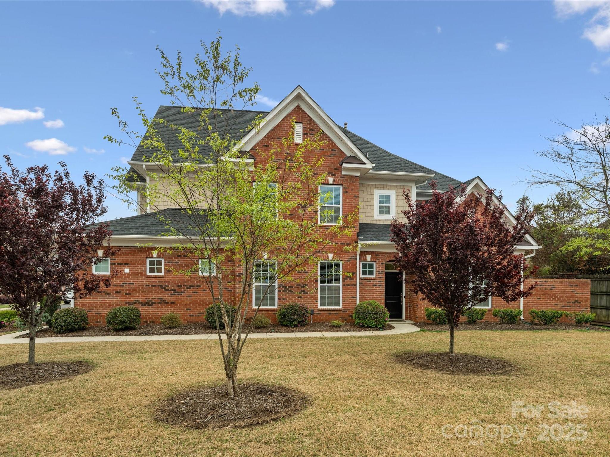 130 Villa Lake Drive Fort Mill, SC 29708 - Photo 3 of 46 a front view of a house with a yard