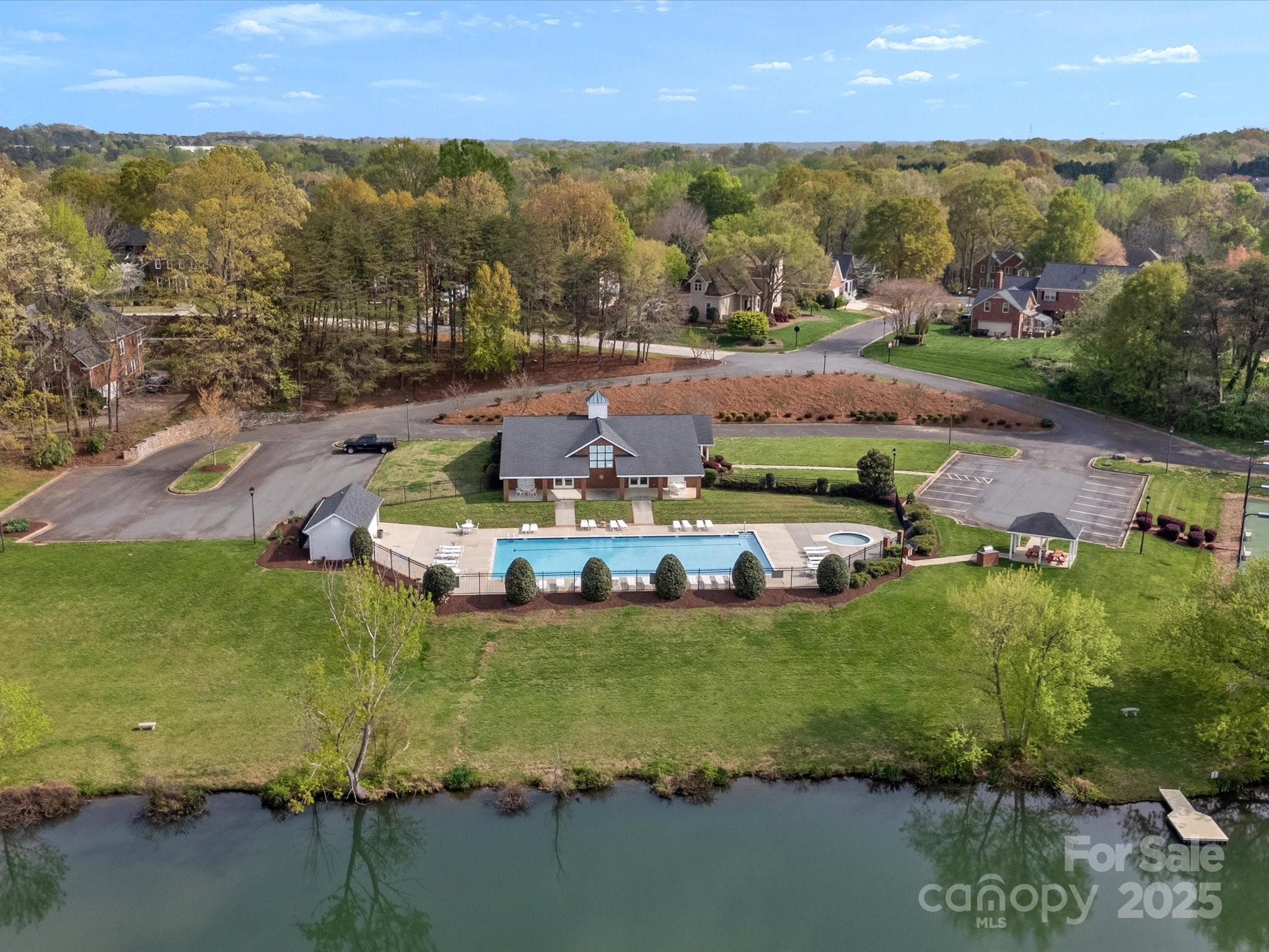 130 Villa Lake Drive Fort Mill, SC 29708 - Photo 39 of 46 an aerial view of residential houses with outdoor space and swimming pool