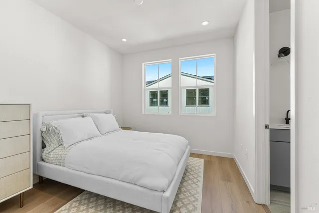 a room with a bed and a window