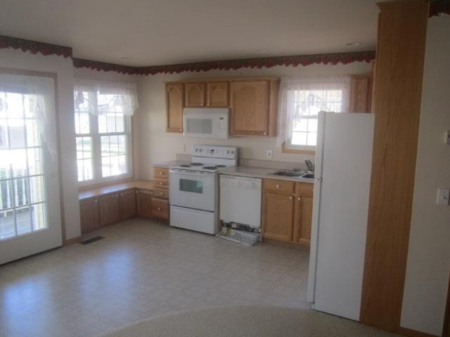 8502 Silver Lake Road, Unit 5 Mears, MI 49436 - Photo 3 of 9 263-464552 8502 w silverlake rd kitchen