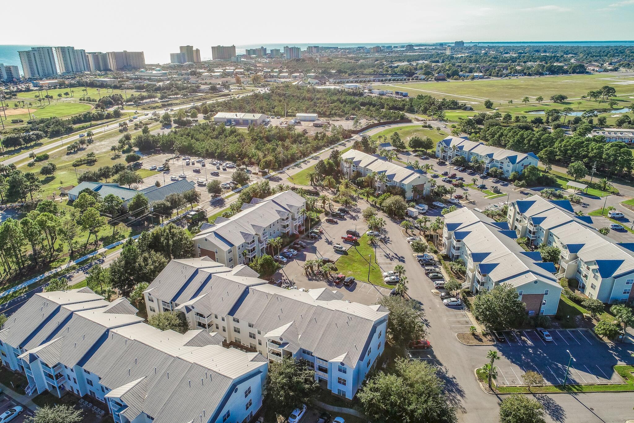 4070 Dancing Cloud Court, Unit 187 Destin, FL 32541 - Photo 8 of 20 an aerial view of residential building and lake