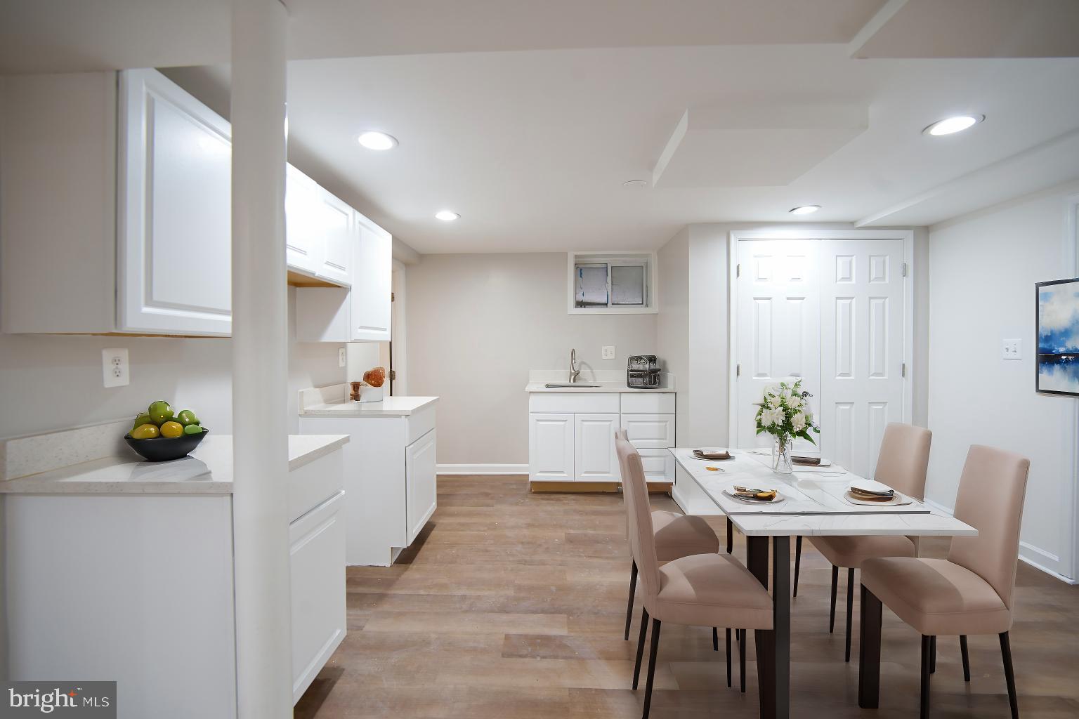 12214 Connecticut Avenue Silver Spring, MD 20902 - Photo 13 of 18 a view of a dining room with furniture and window