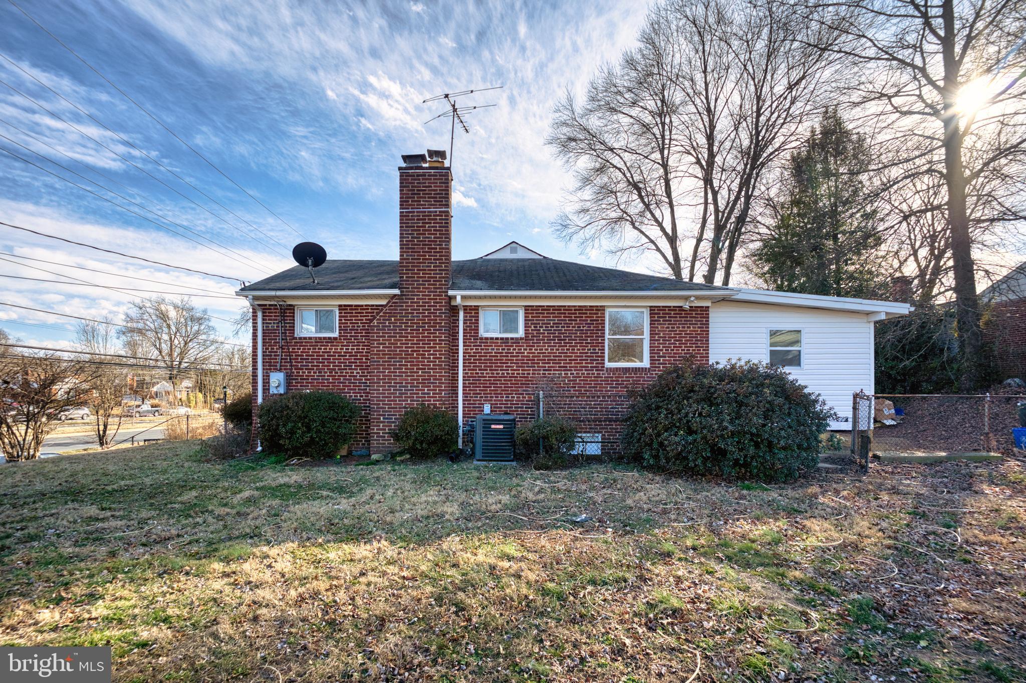 12214 Connecticut Avenue Silver Spring, MD 20902 - Photo 18 of 18 a front view of a house with garden