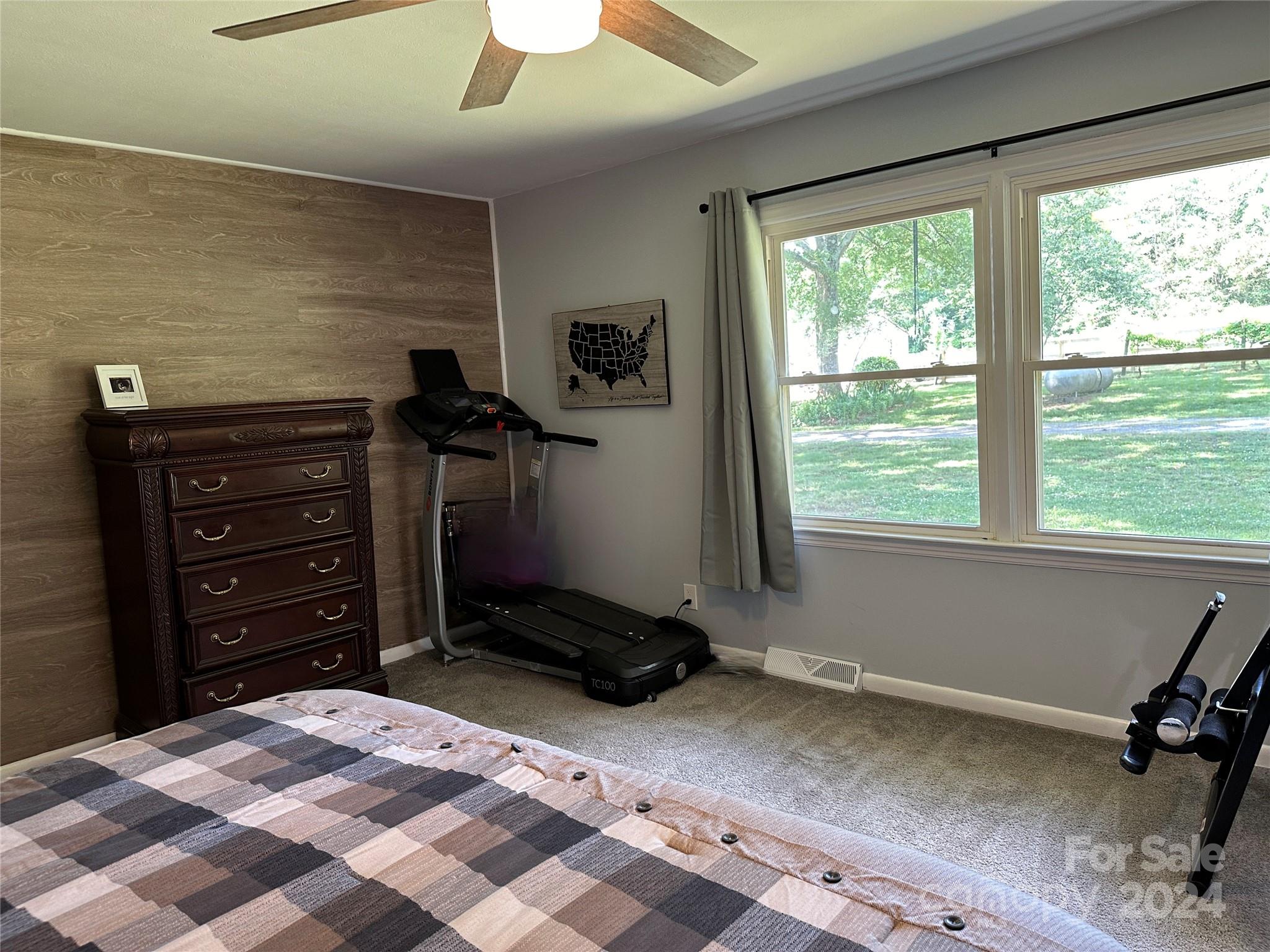1118 Stack Road Monroe, NC 28112 - Photo 18 of 42 a bedroom with a bed and a window